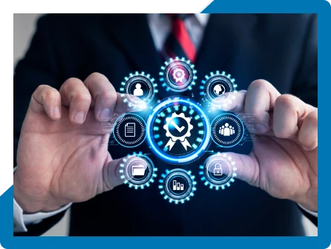 Hands holding a glowing cluster of gear and process icons, representing Bamshaw's disciplined, standards-driven operating approach
